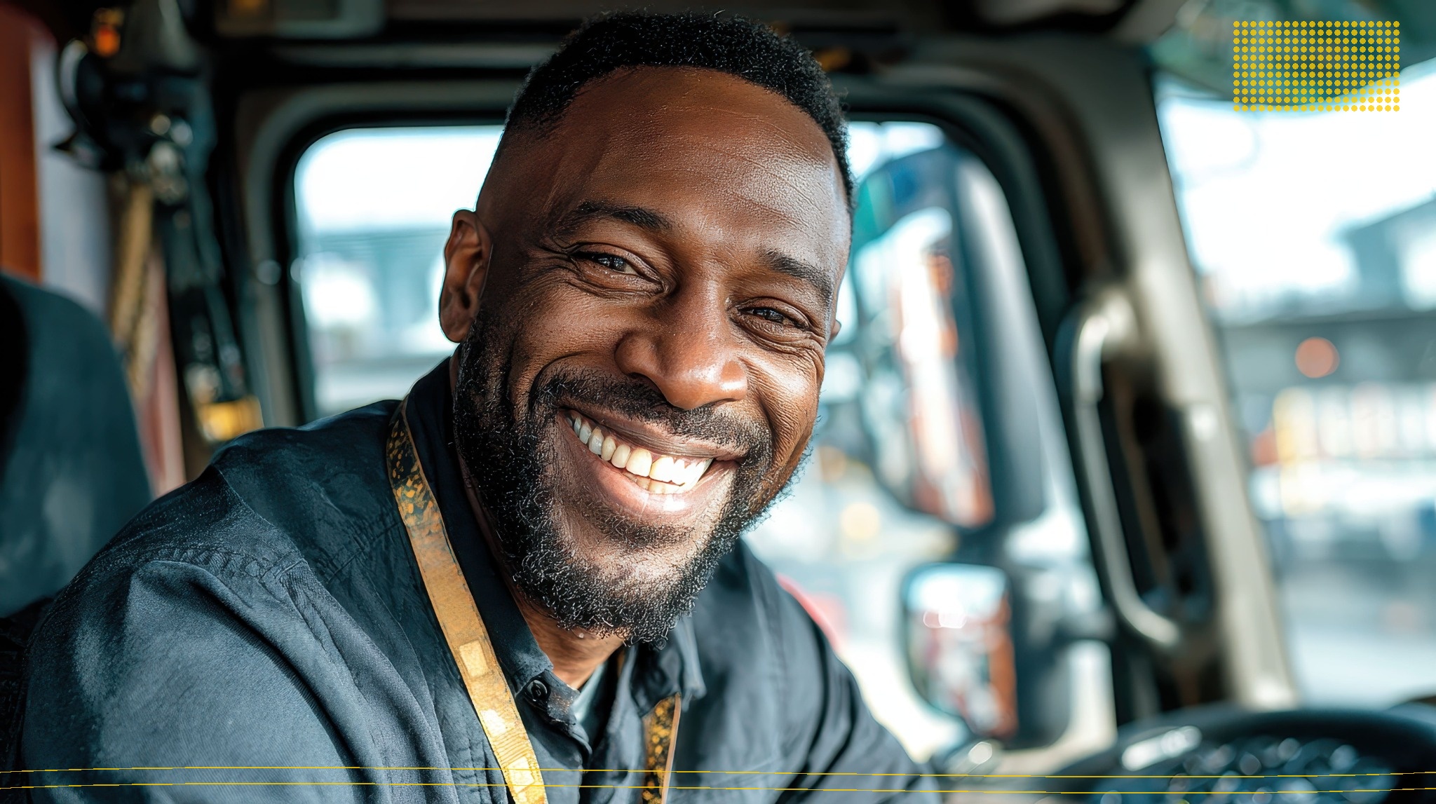 Smiling truck driver representing the workers and stakeholders in wage negotiations